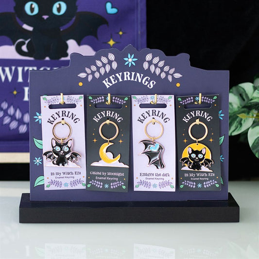 Set of 24 Cute and Creepy Keyrings on Display